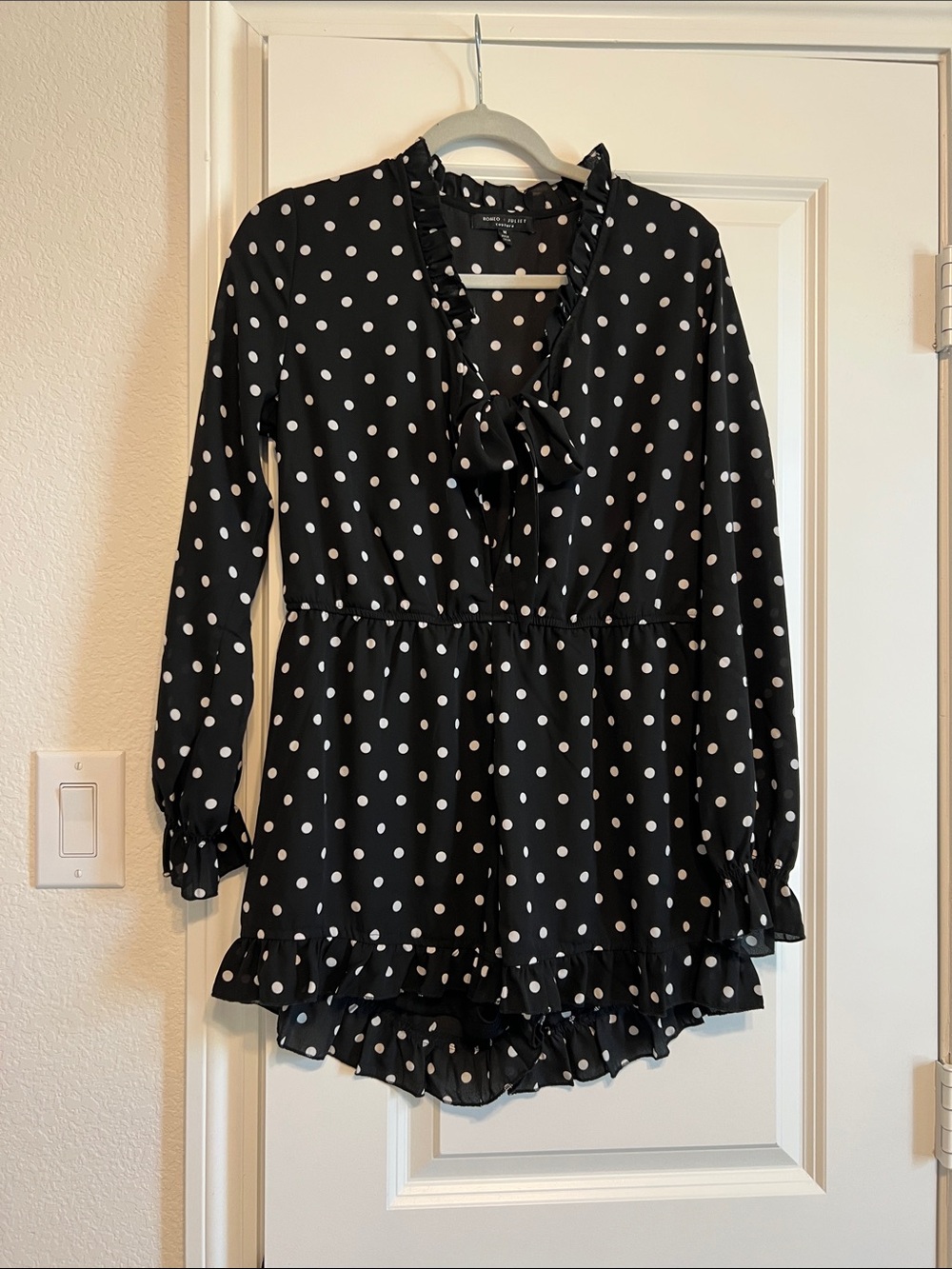 Romeo & Juliet Couture Black and White Polka Dot Tie-Neck Romper